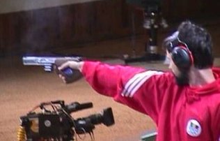 Iulian shooting in the Olympic Final